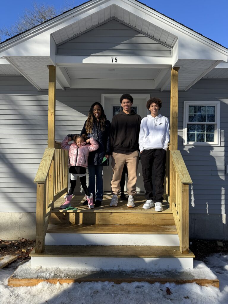 Picture of new homeowners at Tenth Street Leominster